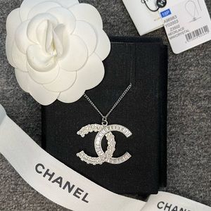 Chanel Large Silver Baguette And Round Crystal CC Logo Pendant Necklace